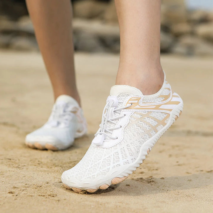 "Dameswaterschoenen ademend sneldrogend met grip, flexibel lichtgewicht ontwerp en anti-slipzool voor wateravonturen."