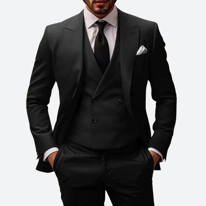 "Elegant 3-delig herenpak, modern fit, met colbert, broek en vest. Perfect voor zakelijke of speciale gelegenheden."