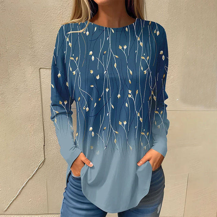 "Elegant dames T-shirt met bloeiende bloemenprint en kleurverloop, lange mouwen en ronde hals, ideaal voor elke gelegenheid."
