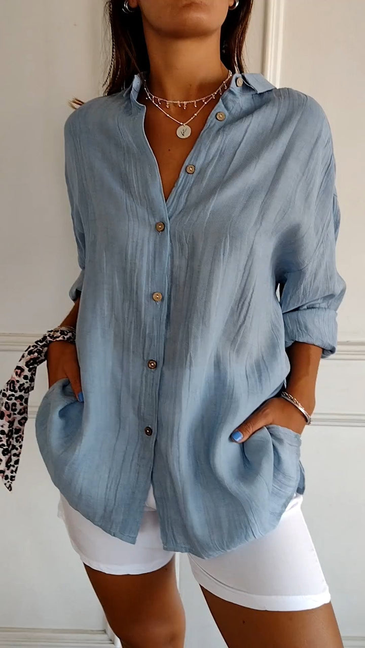 Elegant damesoverhemd met geplooide voorkant, perfect voor een stijlvolle kantooroutfit.