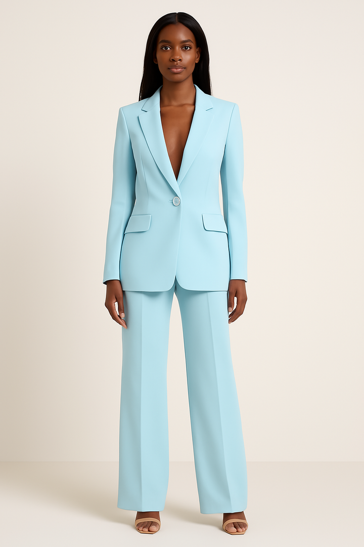 Elegant damespak met getailleerde blazer en stijlvolle rechte broek, perfect voor kantoor of chique gelegenheid.