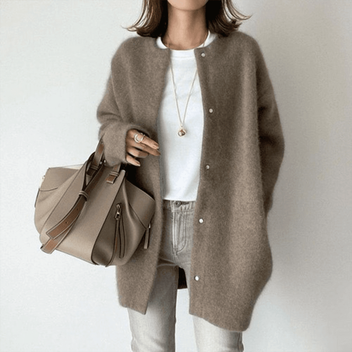 Dames elegant vest, een onmisbaar item voor elke garderobe. Biedt warmte en stijl voor de lente en herfst.