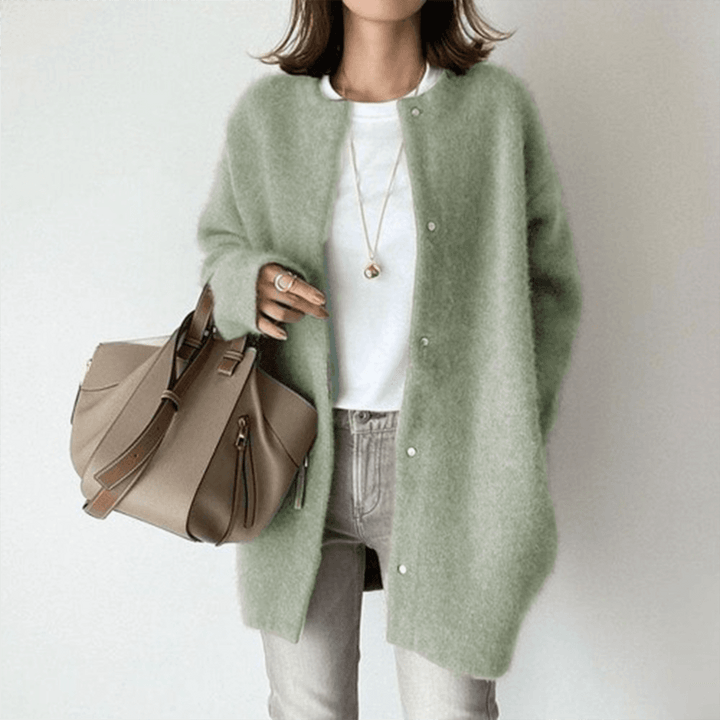 Veelzijdig damesvest, ideaal voor laagjes over blouses of jurken. Creëer een stijlvolle en comfortabele look.