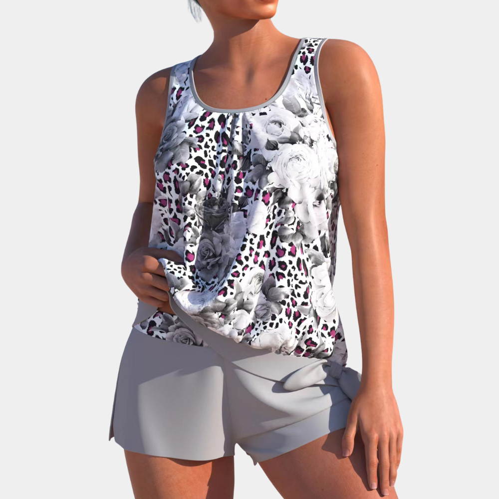 Stijlvol dames badpak Celestia met figuurcorrigerend effect, perfect voor een elegante look op strand of zwembad.