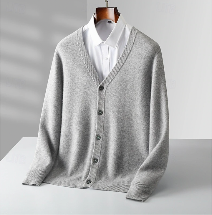 "Elegant heren wollen vest met V-hals en knoopsluiting, tijdloze look in klassieke stijl. Geschikt voor casual of formele gel