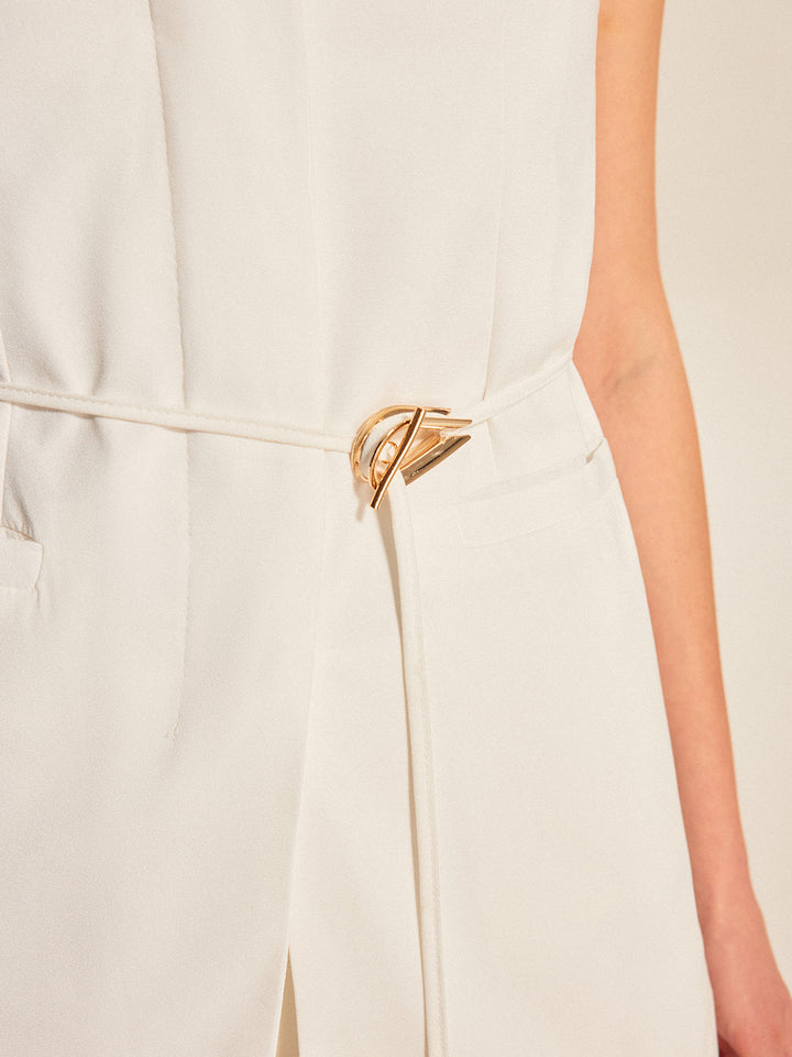 Veelzijdig lang mouwloos damesvest met V-hals en ceintuur, perfect voor casual of chique mode-outfits.