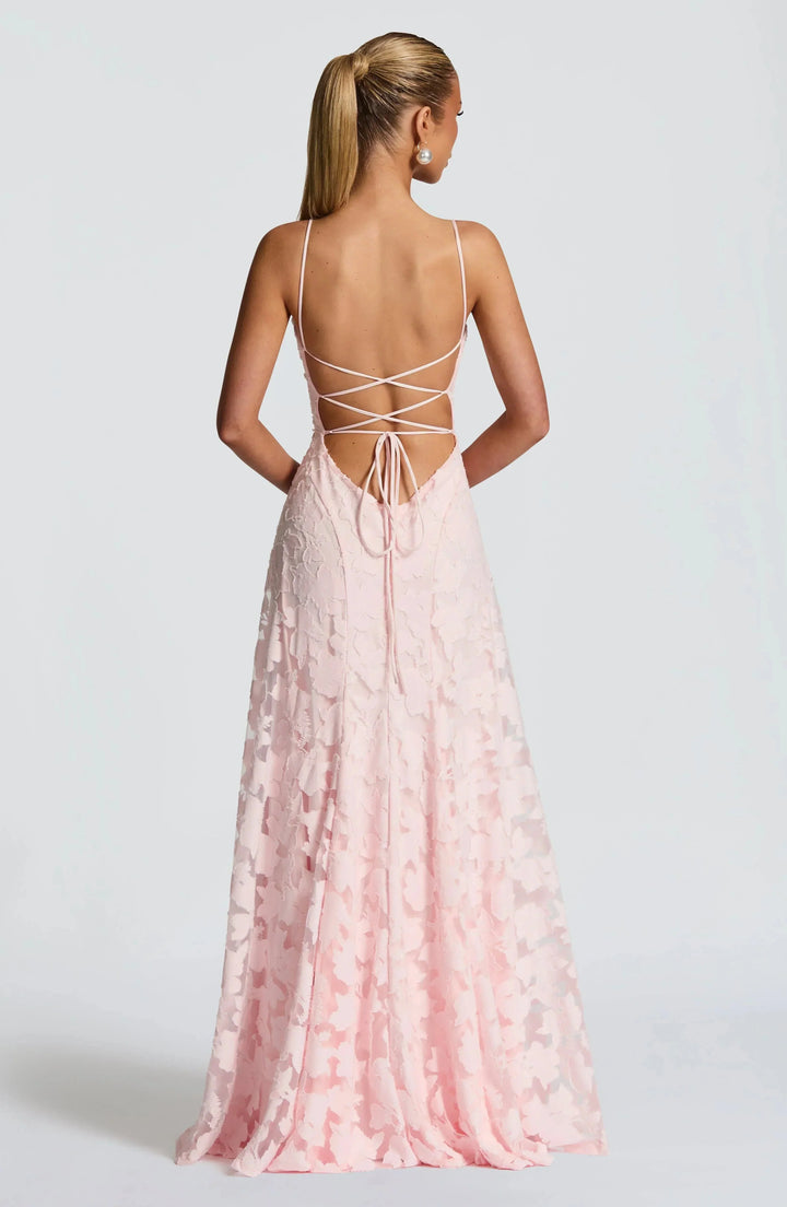 Trendy dames maxi-jurk met A-lijn, open rug en levendige bloemenprint; een echte blikvanger.