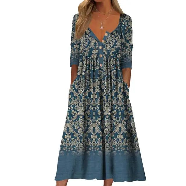 Elegante A-lijn midi jurk met levendige bloemenprint en praktische zakken, ideaal voor zomerse en stijlvolle dagen.