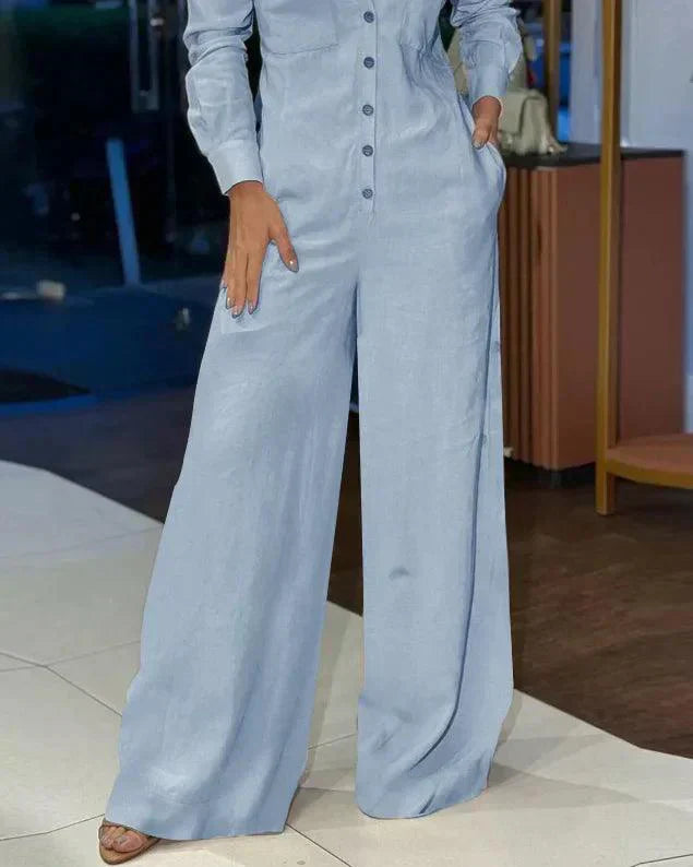 Veelzijdige blauwe dames jumpsuit met lange mouwen en wijde pijpen voor lente, zomer en herfst.