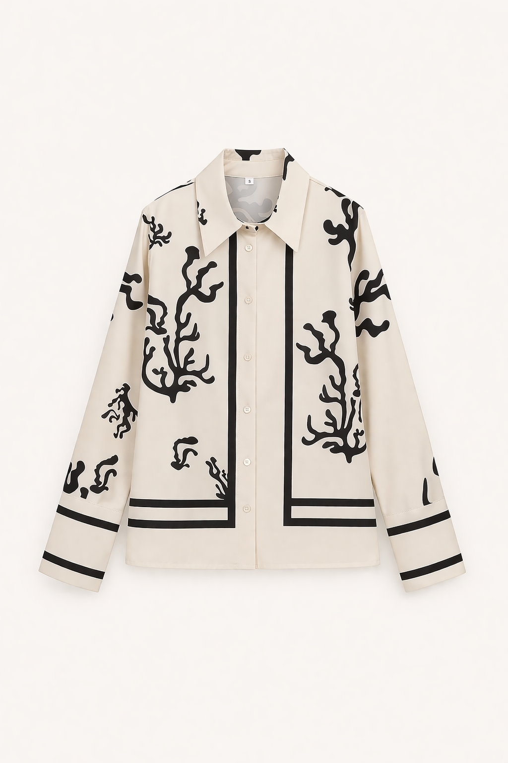 Gedetailleerde pioenroos print op de blouse en wijde broek van deze comfortabele en elegante damesset.