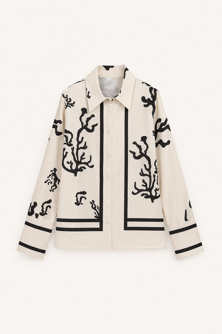Gedetailleerde pioenroos print op de blouse en wijde broek van deze comfortabele en elegante damesset.