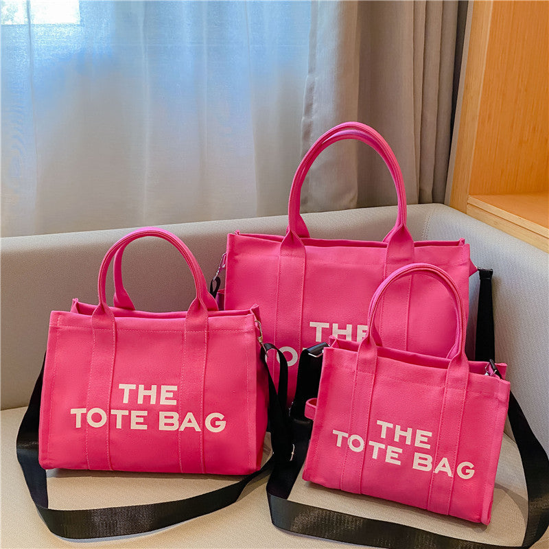Modieuze canvas handtas/schoudertas voor dames, een veelzijdig accessoire dat elegantie en functionaliteit combineert.