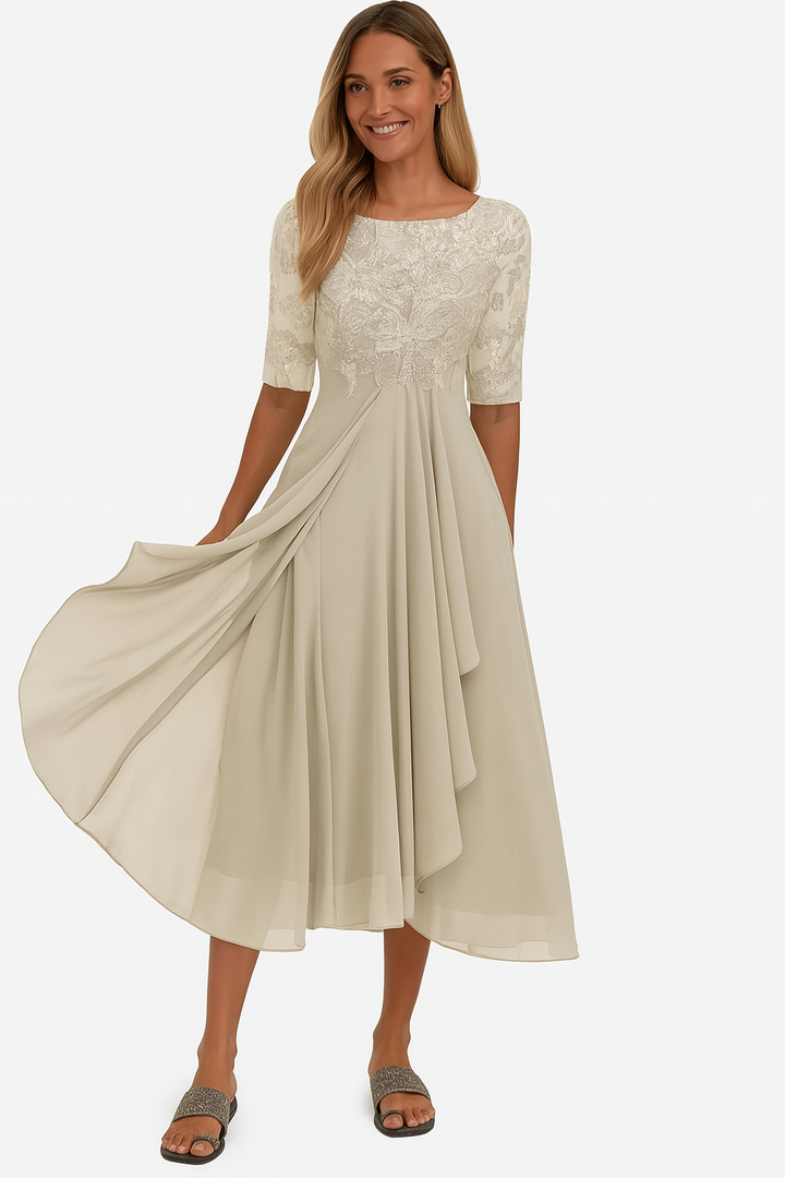 Groene dames midijurk met verfijnd sierlijk bovenstuk en wijde rok, perfecte bruiloftsgast of avondjurk.
