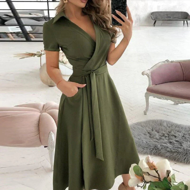Casual chic dames A-lijn jurk met stropdas en zakken, perfect voor elke gelegenheid.