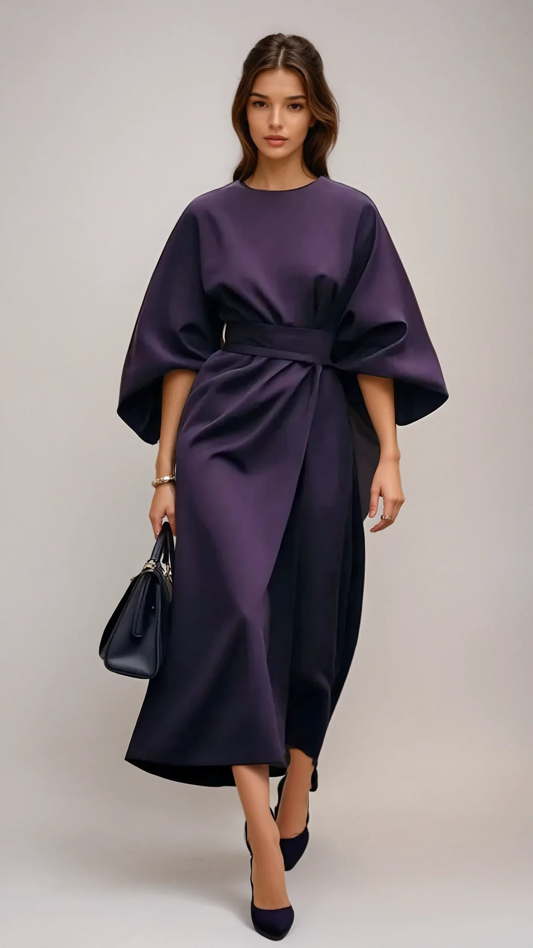 Stijlvolle Calista damesjurk, een vrouwelijke midi jurk met elegante lantaarnmouwen voor een tijdloze uitstraling.