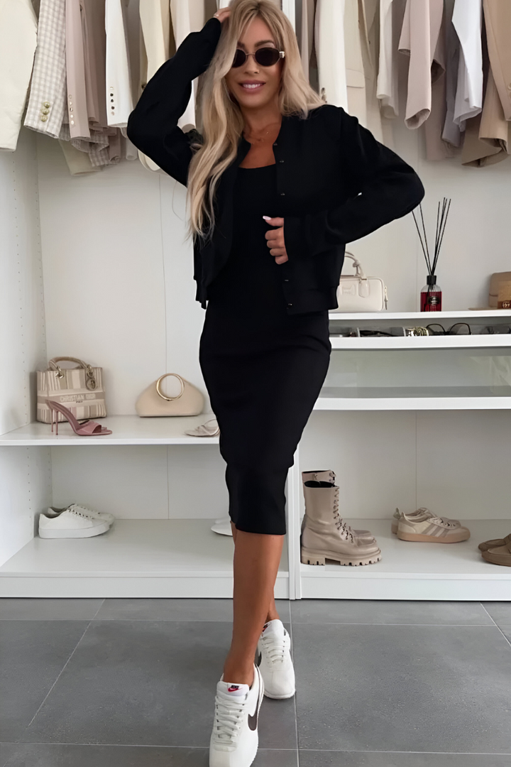 Stijlvolle midi jurk en bijpassend vest voor dames. Ideaal als complete, elegante co-ord set.