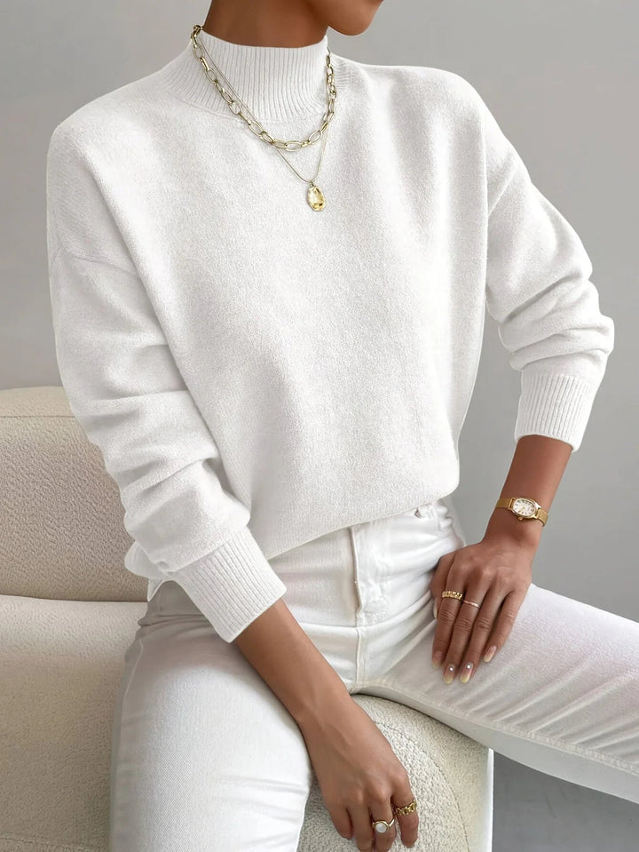 Elegante dames coltrui met hoge hals en soepele pasvorm, ideaal voor winter en herfstmode.