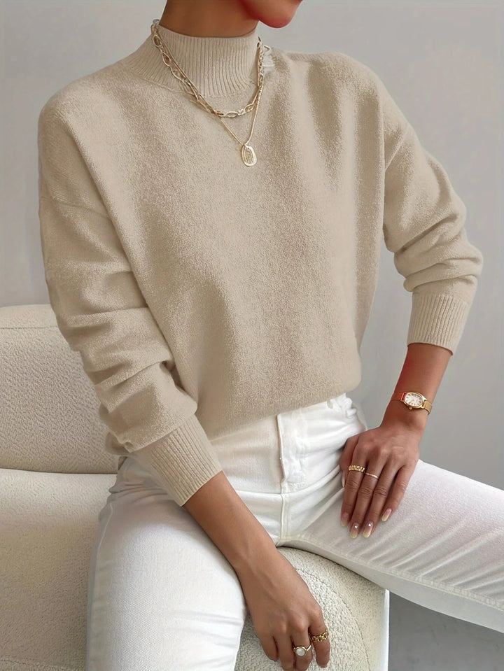 Zachte dames coltrui met elegante hoge hals en fijne pasvorm; een must-have wintertrui.