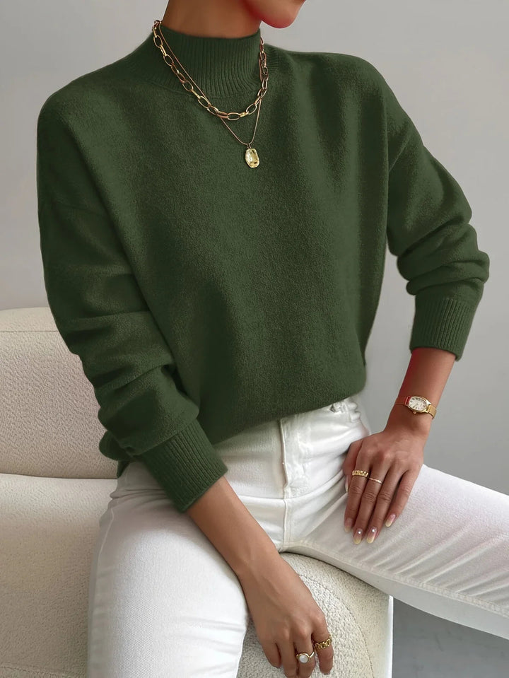 Elegante dames coltrui, hoge hals, comfortabele pasvorm. Veelzijdige wintertrui voor modieuze dames.