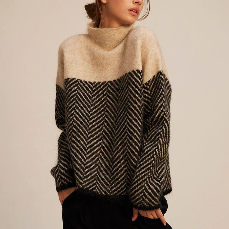 Elegante dames coltrui met stijlvol visgraatpatroon. Comfortabele herfst/winter trui voor een chique look.