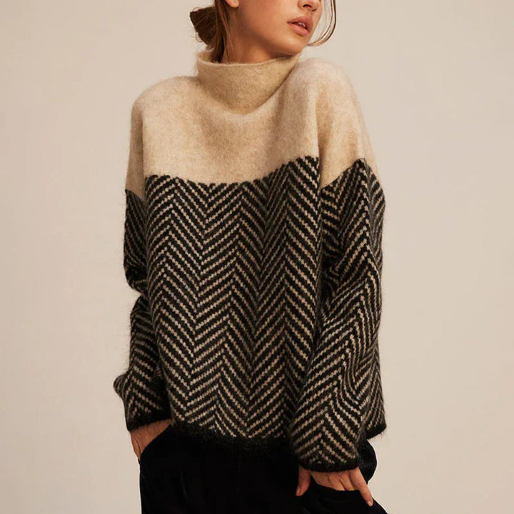 Elegante dames coltrui met stijlvol visgraatpatroon. Comfortabele herfst/winter trui voor een chique look.