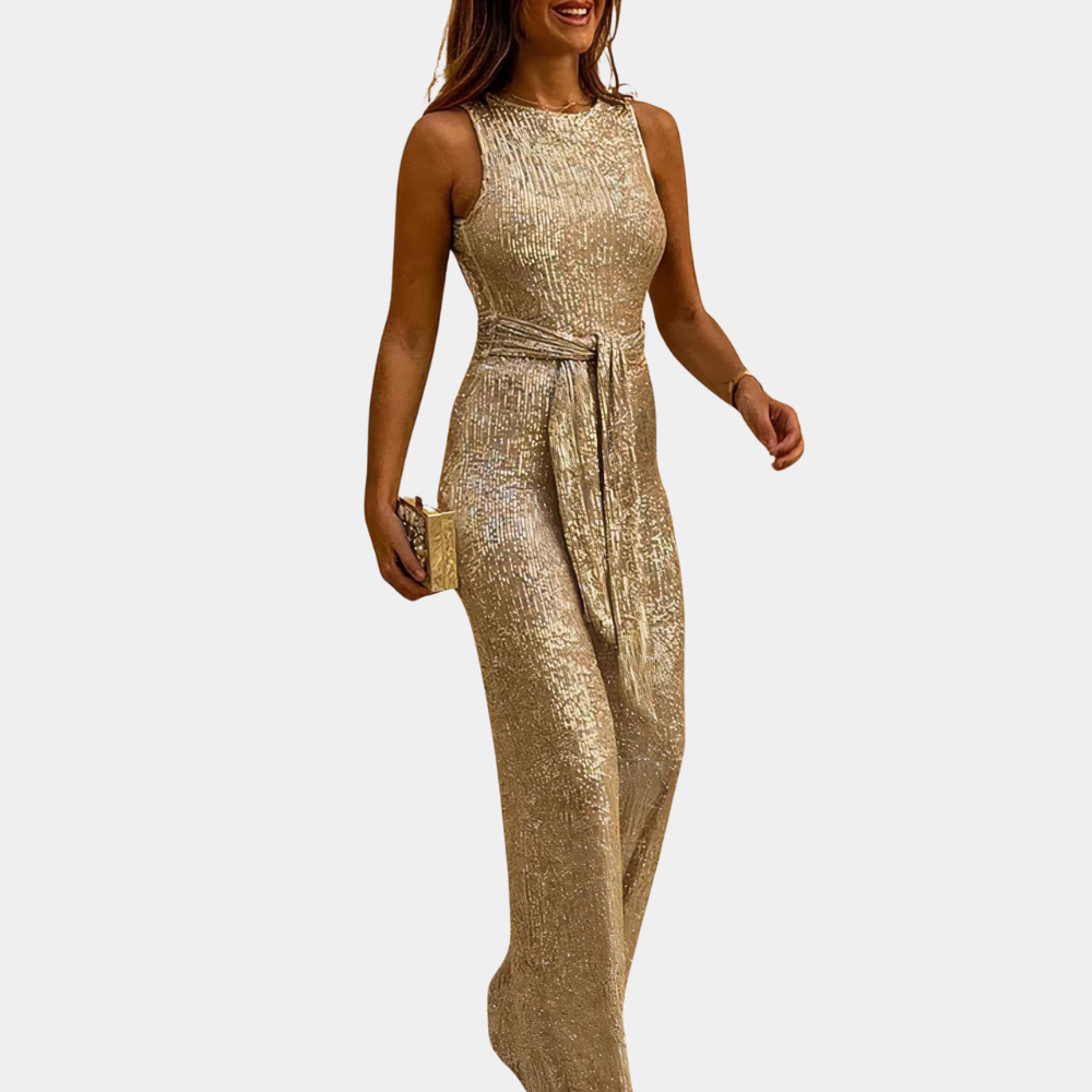 Deze feestelijke glitter jumpsuit is de perfecte gala outfit of bruiloftsgast kleding. Stijlvol en chique.