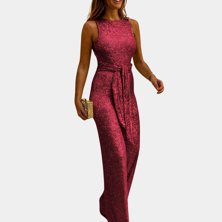 Blauwe elegante jumpsuit met glitter, ideaal als cocktail jumpsuit of gala outfit voor dames.