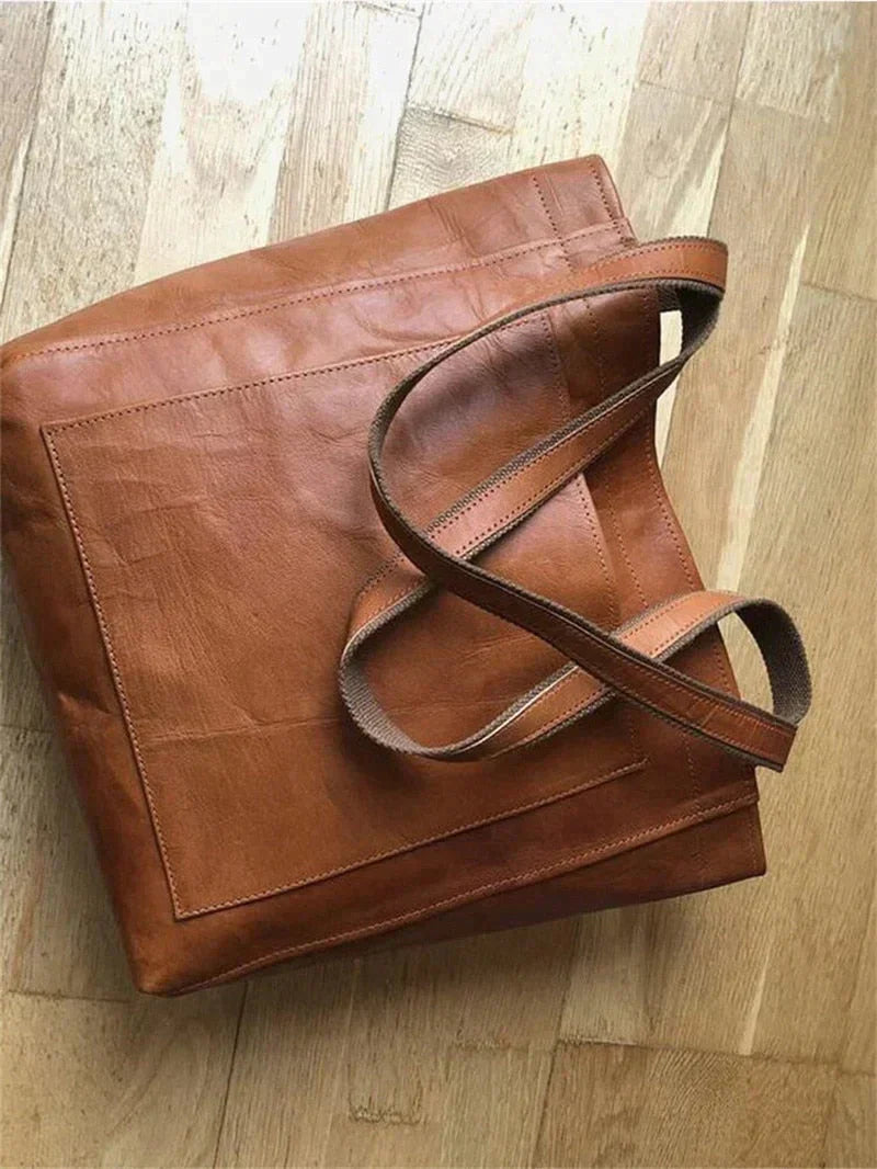 Ruime veganistische leren handtas voor dames, elegant en veelzijdig. Te dragen als schoudertas, duurzaam.