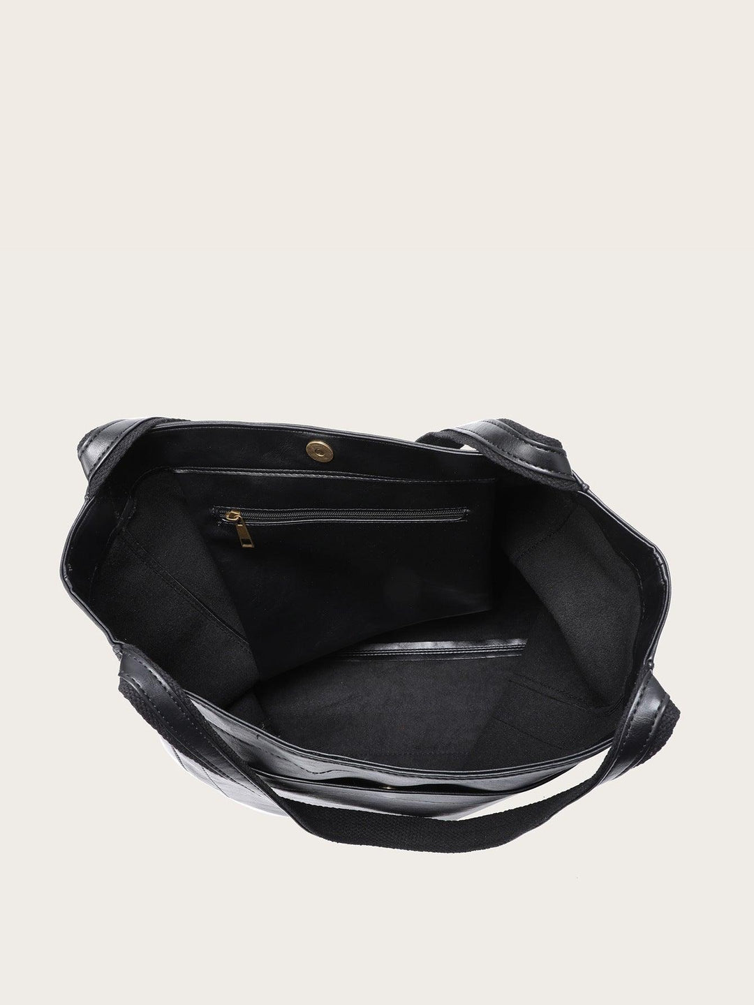 Moderne zwarte vegan leren dames handtas, ruim en elegant. Een modebewust en duurzaam accessoire voor de dame.