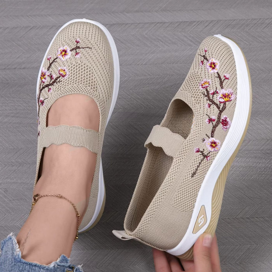 Elegante dames instapsneakers met bloemdessin en ademend bovenwerk. Orthopedisch comfort. Perfect voor dagelijks gebruik.