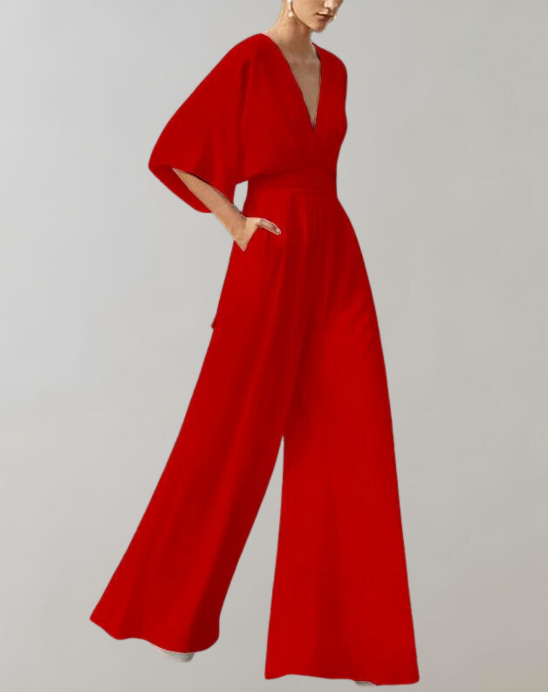 Verfijnde dames jumpsuit met diepe V-hals en wijde pijpen, uitermate geschikt voor elegante evenementen en damesmode.