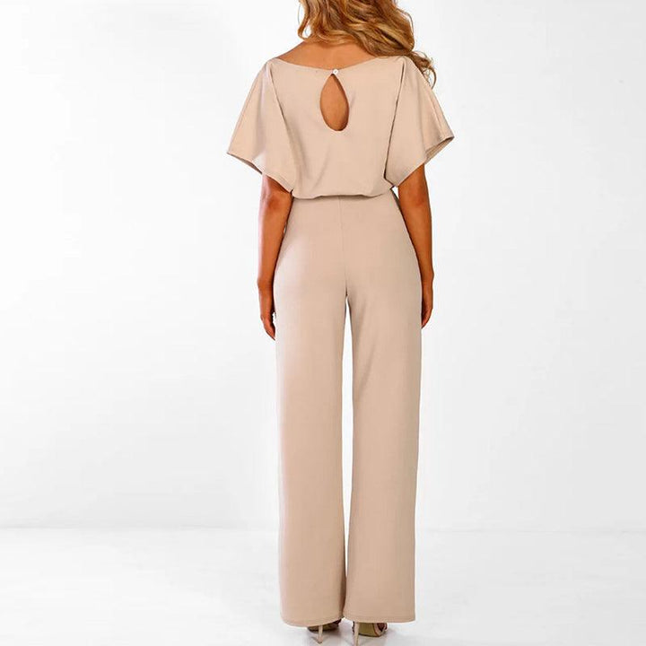 Zakelijke dames jumpsuit met korte mouwen en stijlvolle ceintuur, een elegante keuze voor kantoor.