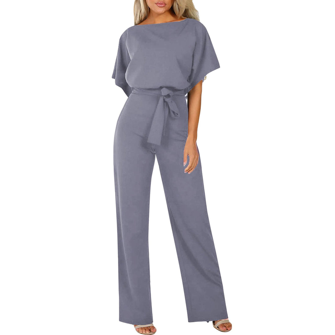Comfortabele dames jumpsuit met wijde pijpen en flatterende tailleceintuur. Ideaal voor zomer en vrije tijd.