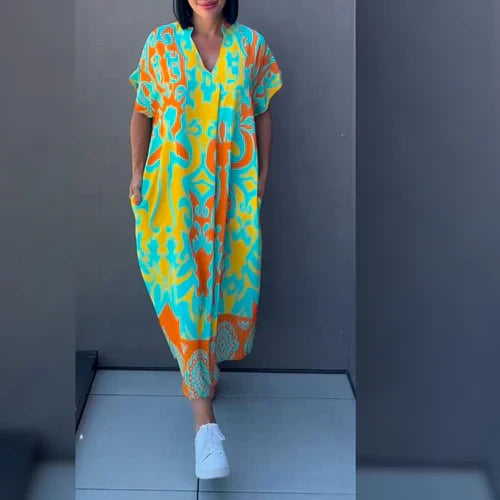Luchtige midi kaftan damesjurk, veelzijdig als zomerjurk of elegante strandjurk voor vakantie.