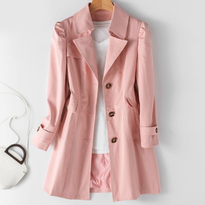 Stijlvolle korte dames trenchcoat, comfortabele tussenjas die elegantie combineert met functionaliteit. Tijdloos design.