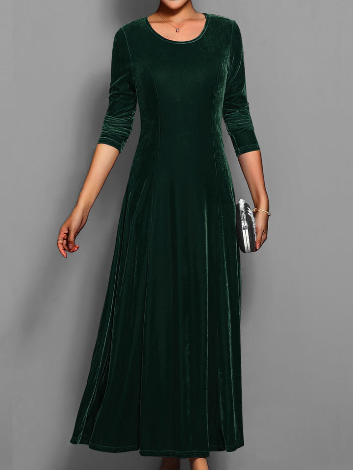 Chique damesmode: een stijlvolle maxi jurk met lange mouwen en ronde hals voor elke gelegenheid.