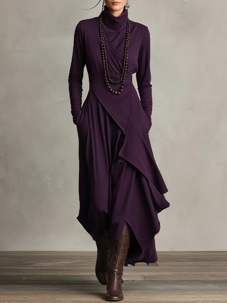 Stijlvolle maxi jurk voor dames met hoge col, lange mouwen en trendy asymmetrische rok. Ideaal voor feestjes.