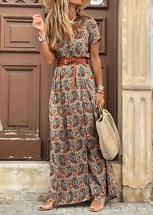 Veelzijdige dames maxi jurk met paisley patroon en V-hals. Geschikt als elegante zomer-, strand- of festivaljurk.