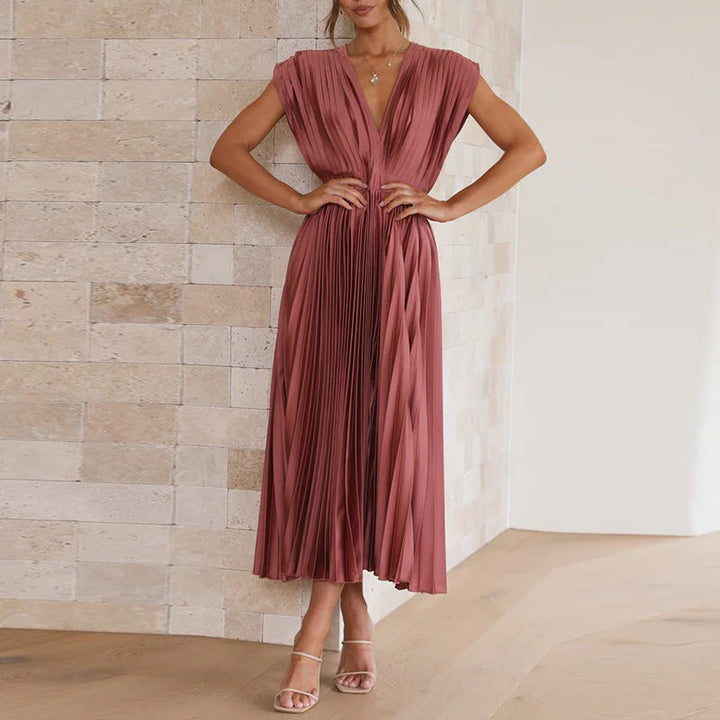 Casual doch elegante dames maxi jurk met diepe V-hals, verstelbaar en rugloos design.