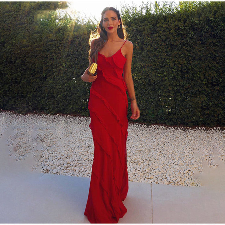 Elegante dames maxi jurk met ruffles en hoge split, perfect voor feesten, bruiloften en avondjes uit.