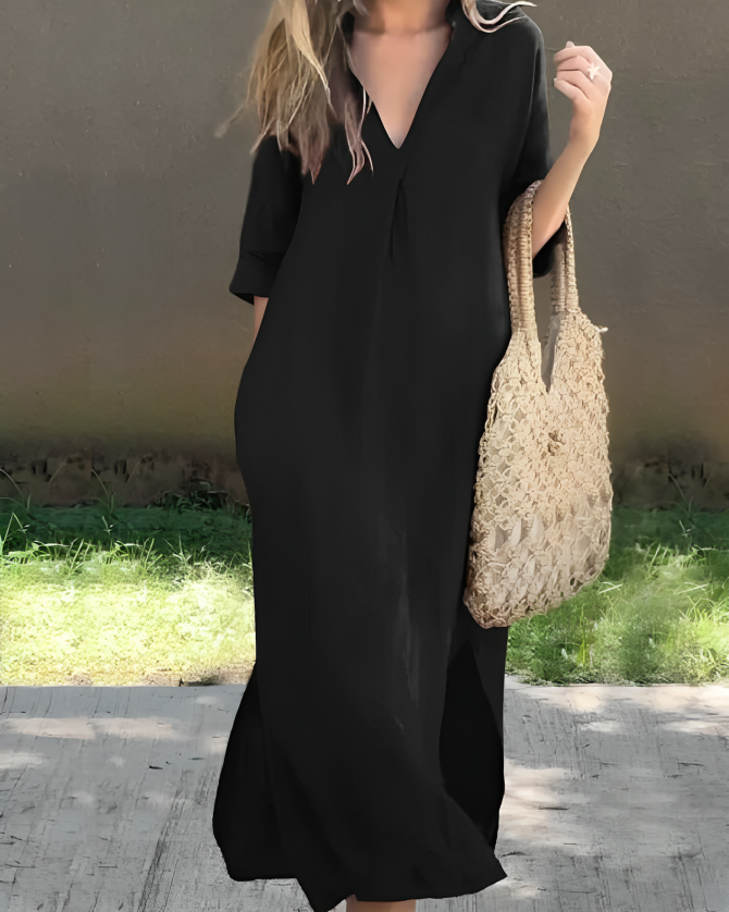 Casual lange dames jurk met V-hals, kraag en praktische zakken, perfect voor een relaxte zomerlook.