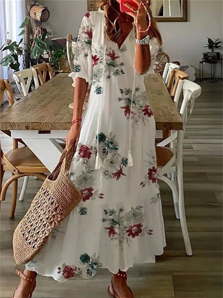 Elegante dames maxi-jurk voor de zomer, met vloeiende stof en comfortabele pasvorm. Perfect voor feestjes.