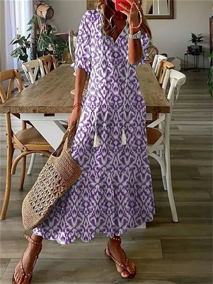 Vloeiende dames zomerjurk, een comfortabele maxi-jurk met elegante flow. Ideaal voor casual of feestelijke gelegenheden.