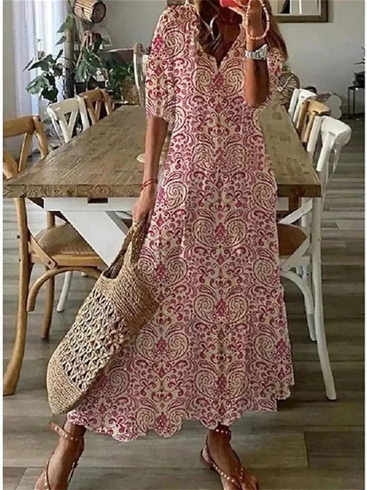 Comfortabele en elegante dames zomer maxi-jurk met vloeiende beweging. Perfecte zomerjurk voor casual en feestelijke momenten.