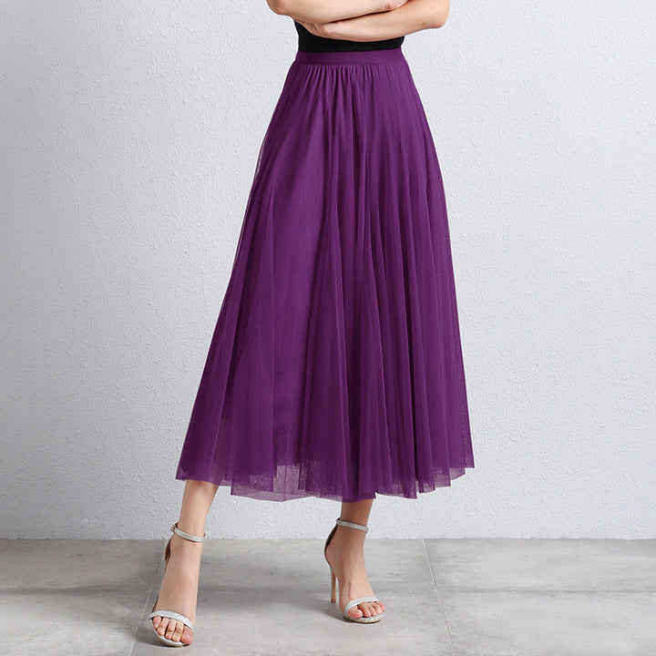 Elegante dames maxi rok met luchtige gelaagdheid, perfect voor zomer en feestelijke gelegenheden.