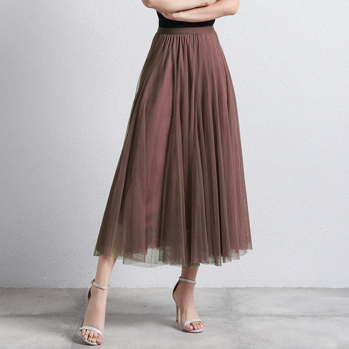 Veelzijdige lange gelaagde rok voor dames, elegant en geschikt voor diverse gelegenheden.