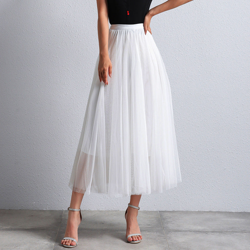 Lange gelaagde zomerrok voor dames, elegant en veelzijdig voor warme dagen.