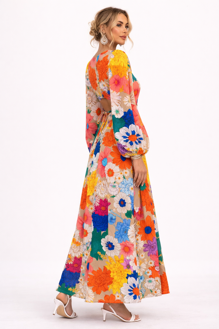 Trendy dames maxi-jurk met elegante bloemenprint en pofmouwen, comfortabel en chic voor elke gelegenheid.