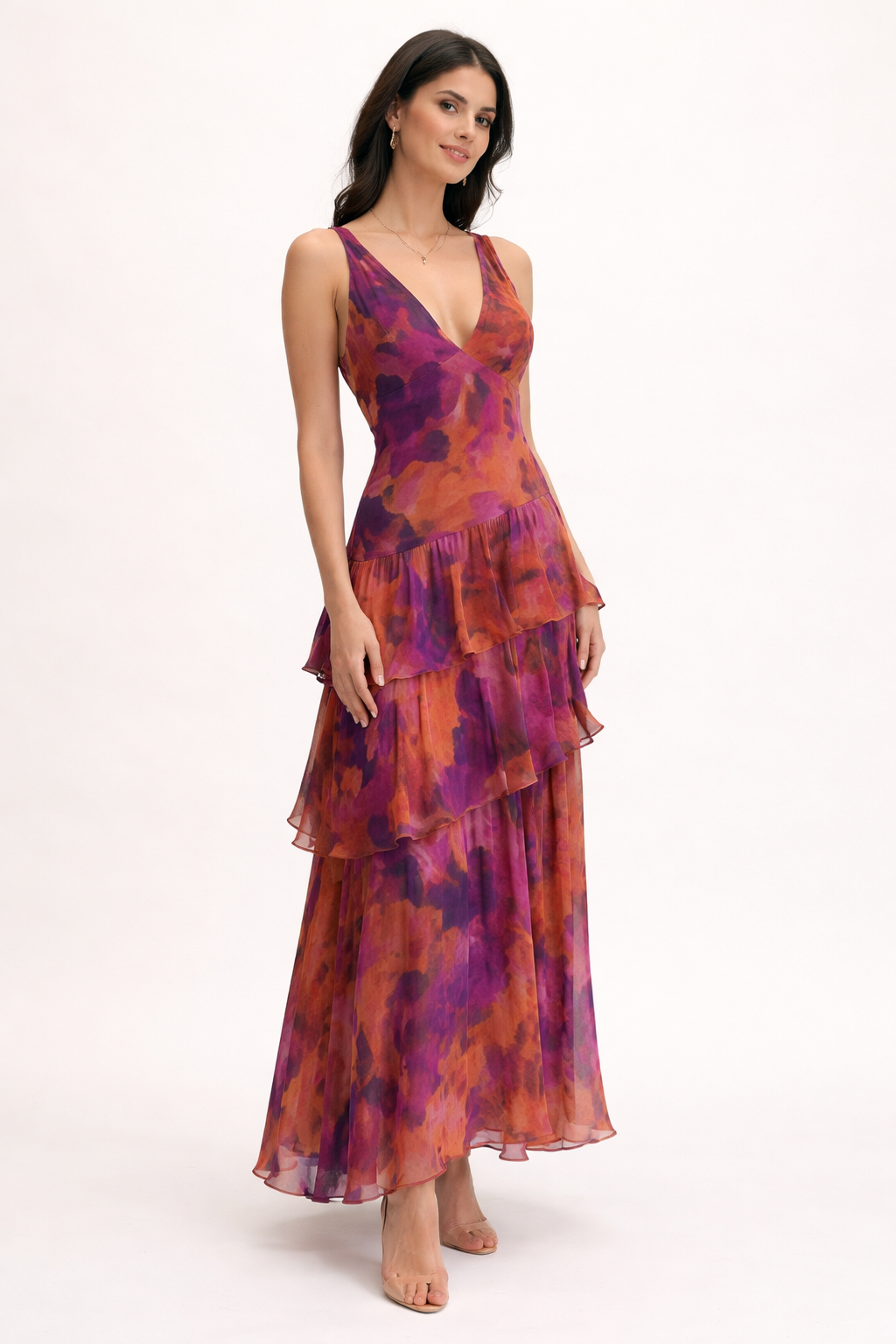Trendy midi jurk dames met vrolijke bloemenprint, comfortabele pasvorm en elegante V-hals, ideaal voor feesten.