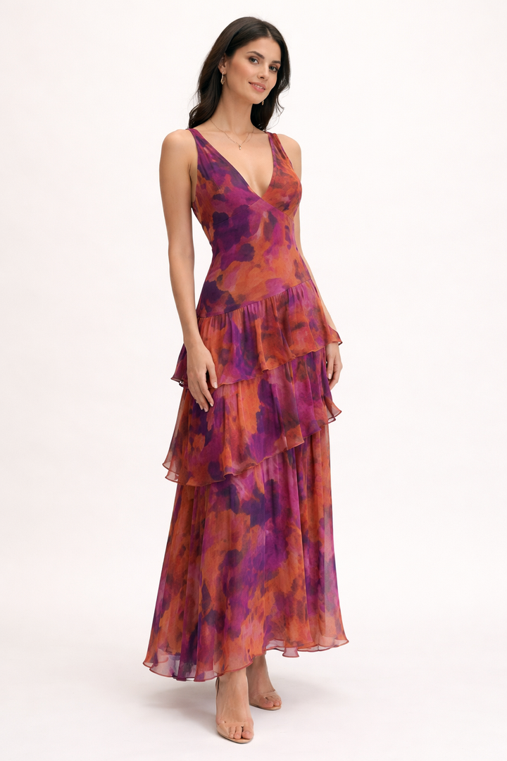 Trendy midi jurk dames met vrolijke bloemenprint, comfortabele pasvorm en elegante V-hals, ideaal voor feesten.
